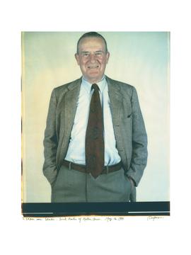 man standing with hands in his pockets